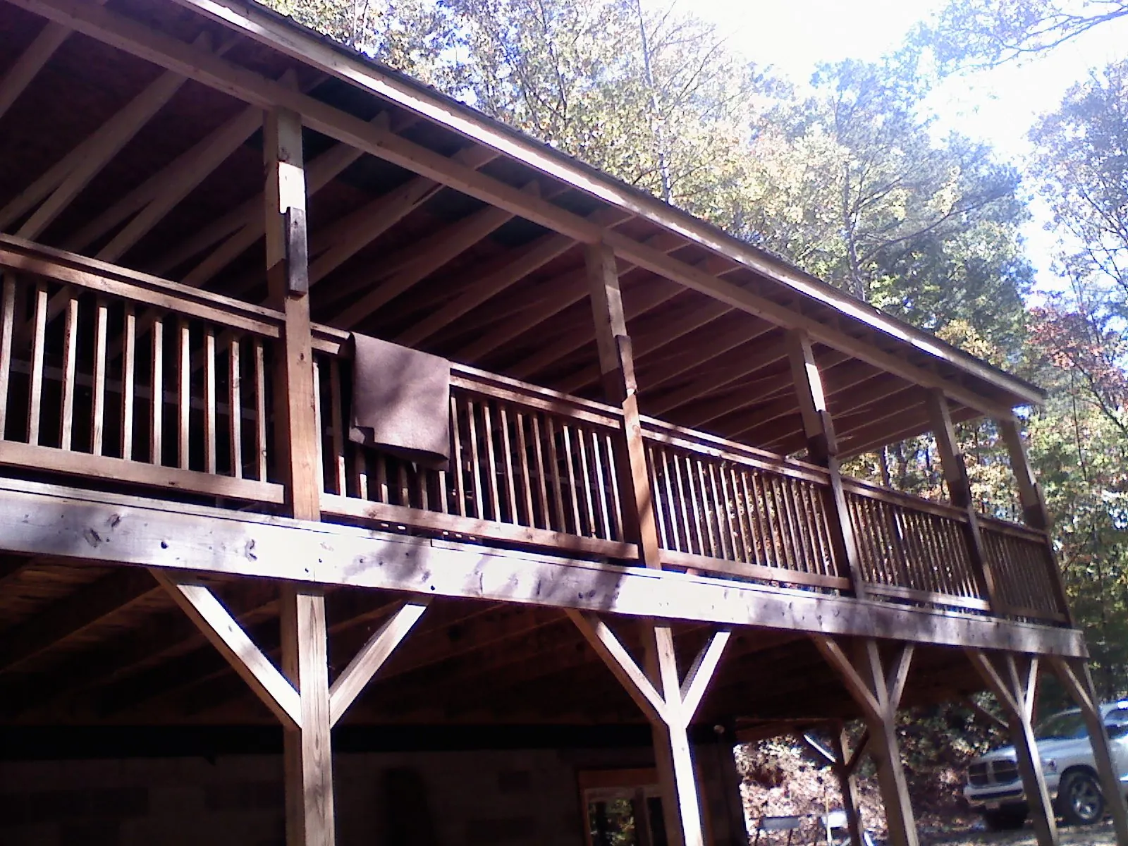 Timber framing under a new elevated porch and deck — Roof Leak Repair in Frisco by Roofing Brothers